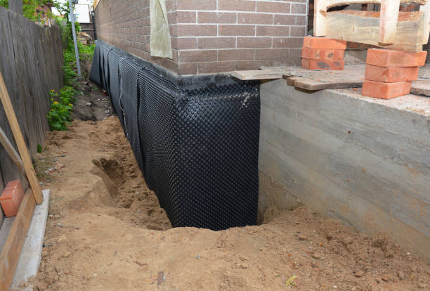 Happy homeowners after waterproofing job in Springport